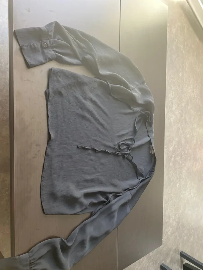 Blouse noir en très bon état H&M