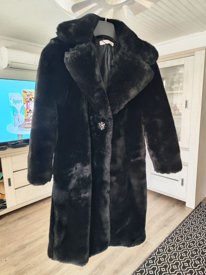 Manteau fausse fourrure
