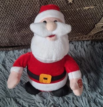 Peluche  père Noël chante en anglais
