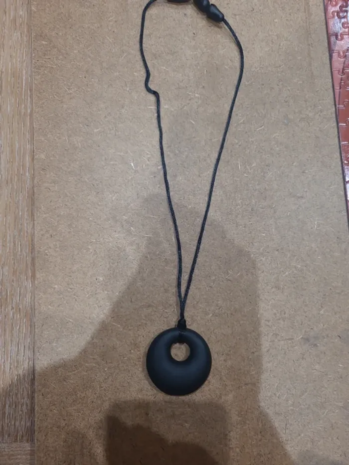 Machouilleur, collier de mastication
