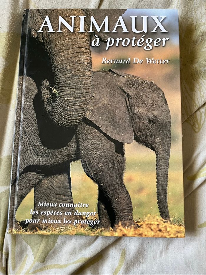 Livre. Animaux à protéger neuf