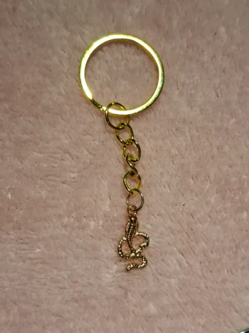 Porte-clé doré serpent 🐍