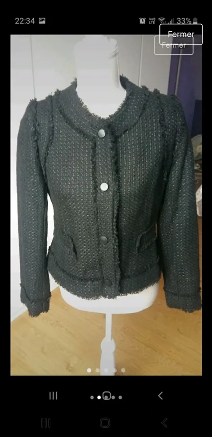 Très jolie veste noire
