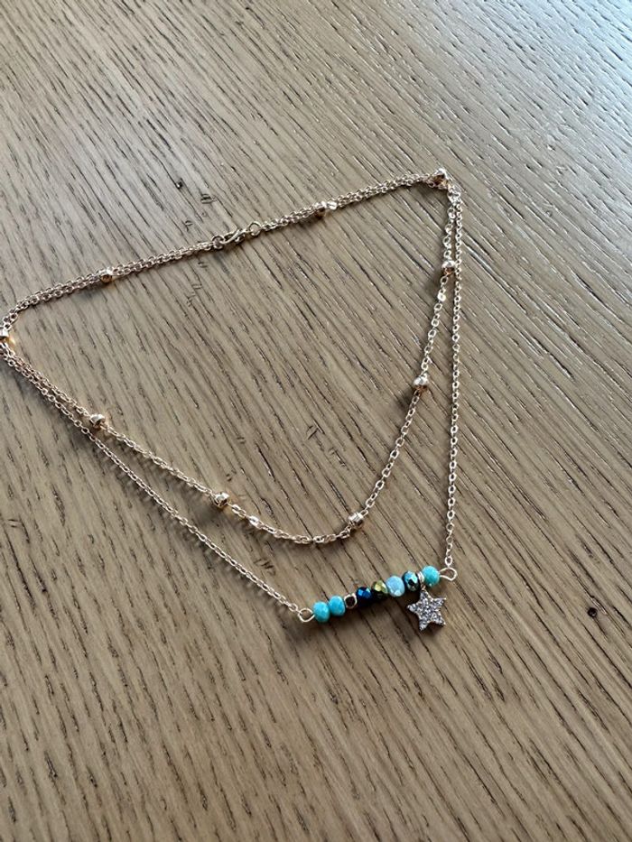 Collier multi-rangs doré perles cristal et étoiles strass