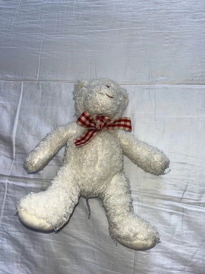 Petit ours en peluche - photo numéro 2