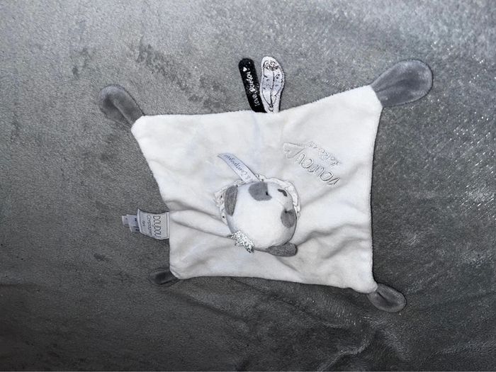 Doudou panda neuf dans sa boîte
