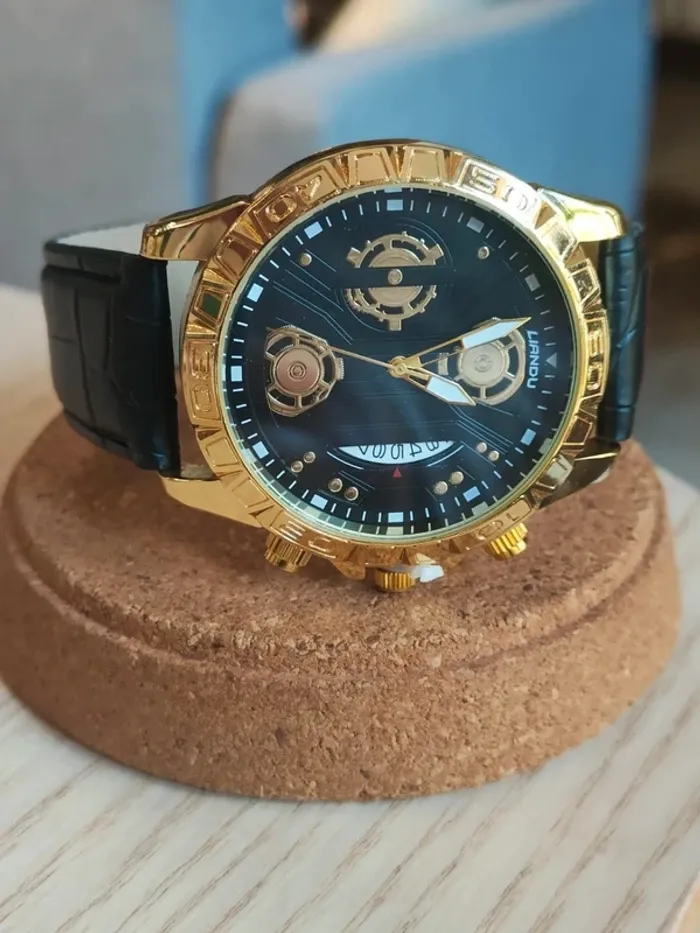 Montre homme noire, dorée, style mécanique - photo numéro 2