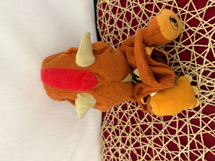 Peluche marionnette dinosaure orange Jurassic world 25 cm - photo numéro 4