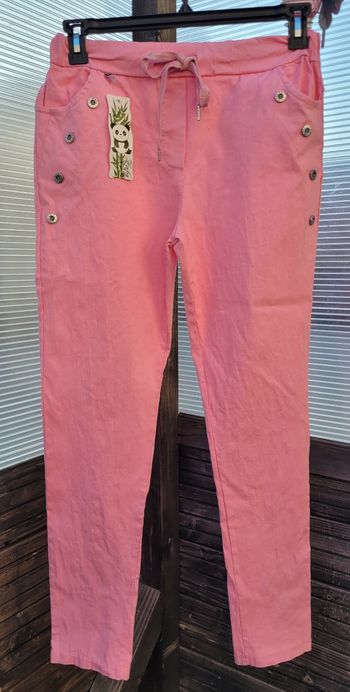 Pantalon magique rose bonbon