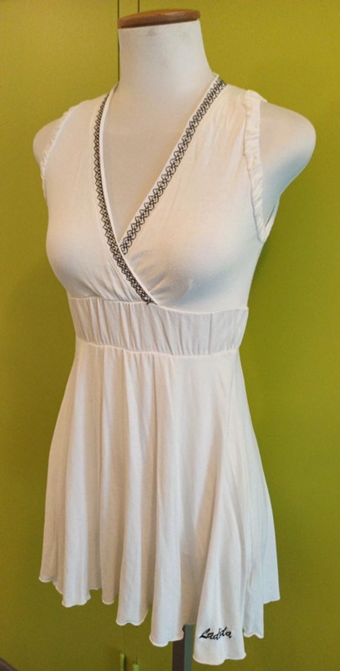 Lot des bluses asimétriques la noir est xs la blanche, et la bleue s/m - photo numéro 2