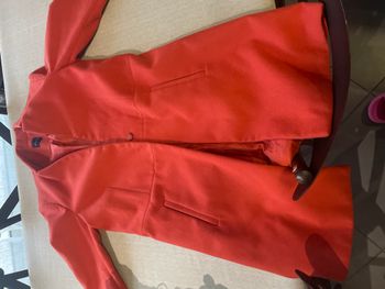 Manteau  orange  porté quelques fois fois