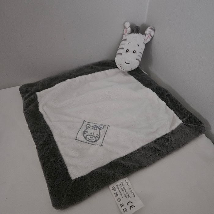 Doudou zèbre action