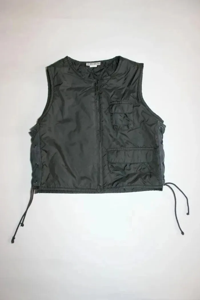 Petite veste matelassée sans manche noire Ikks taille 8 ans