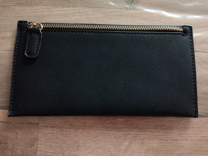 Pochette noire neuve