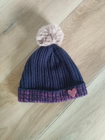 Bonnet en mailles avec pompon fille 3/5 ans