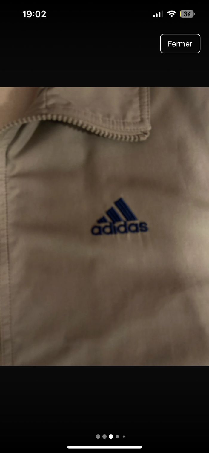 Veste adidas très bonne état une petite tache derrière voir sur la photo taille 48 - photo numéro 3