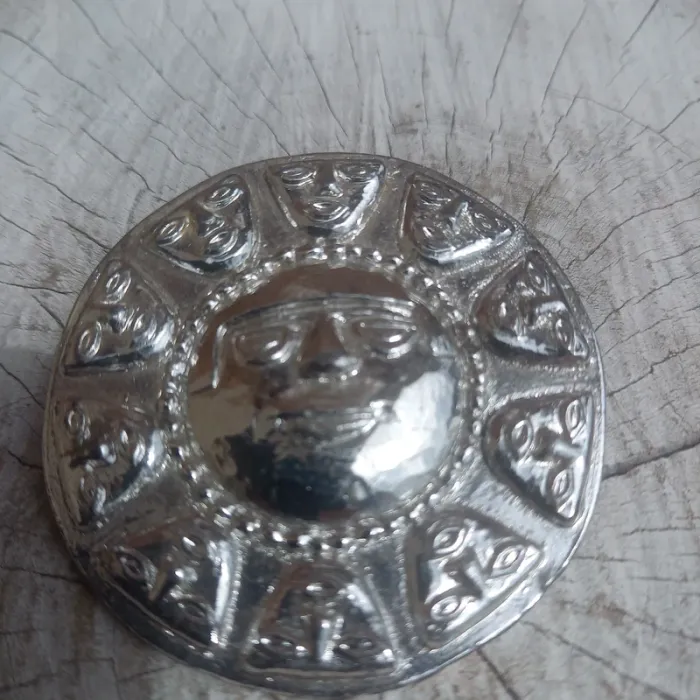 Broche vintage métal poli