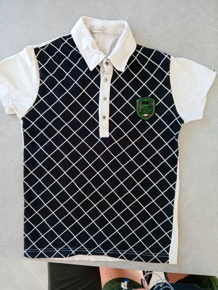 Polo noir et blanc rayé taille S/36