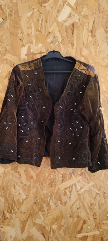 Veste vintage avec grelots