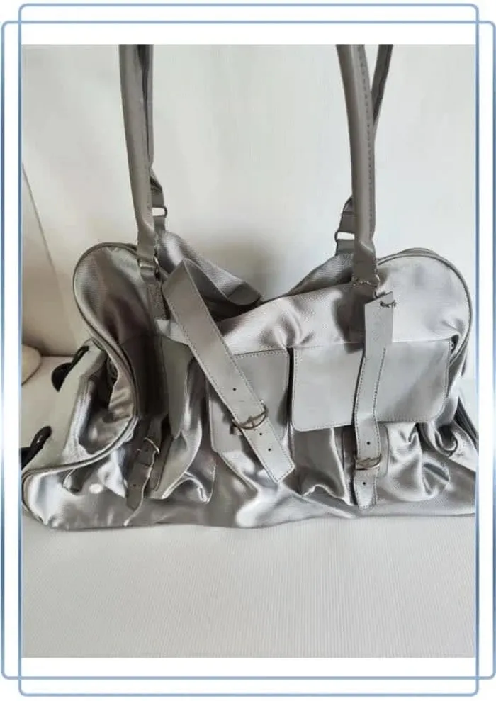 Bagage à roulette Apart argenté, très bon état, 55x25cm