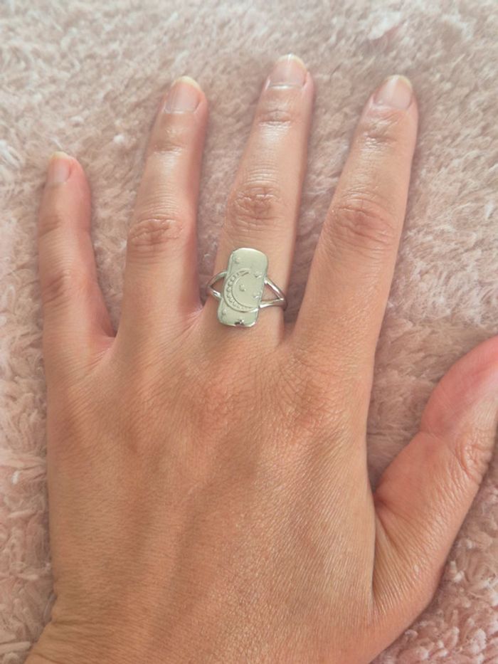 Jolie bague ouverte en acier couleur argent - photo numéro 2