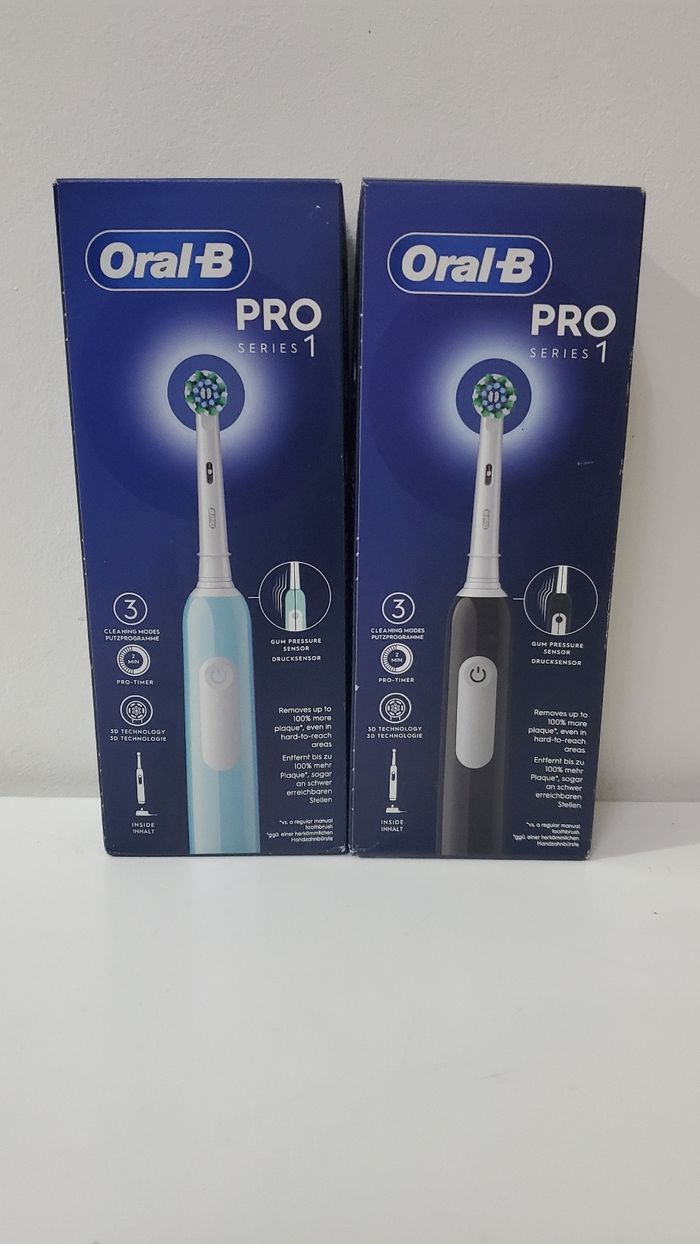 2 Brosses à Dents Électrique Oral B Pro 1, Bleu + Noir. - photo numéro 2