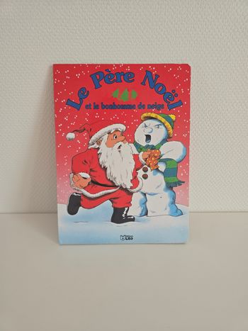 Livre " Le père Noël et le bonhomme de neige "