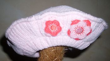 Bonnet type bérêt rose clair "la halle" 3/6 mois état neuf