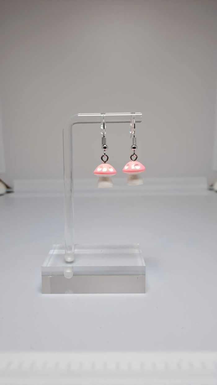 🦚Boucle d'oreilles champions rose