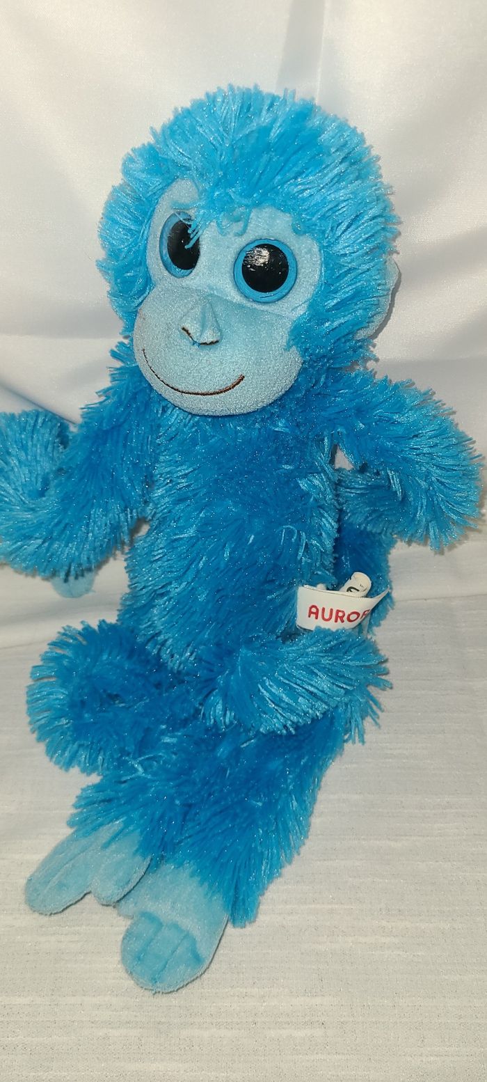 Peluche singe bleu AURORA