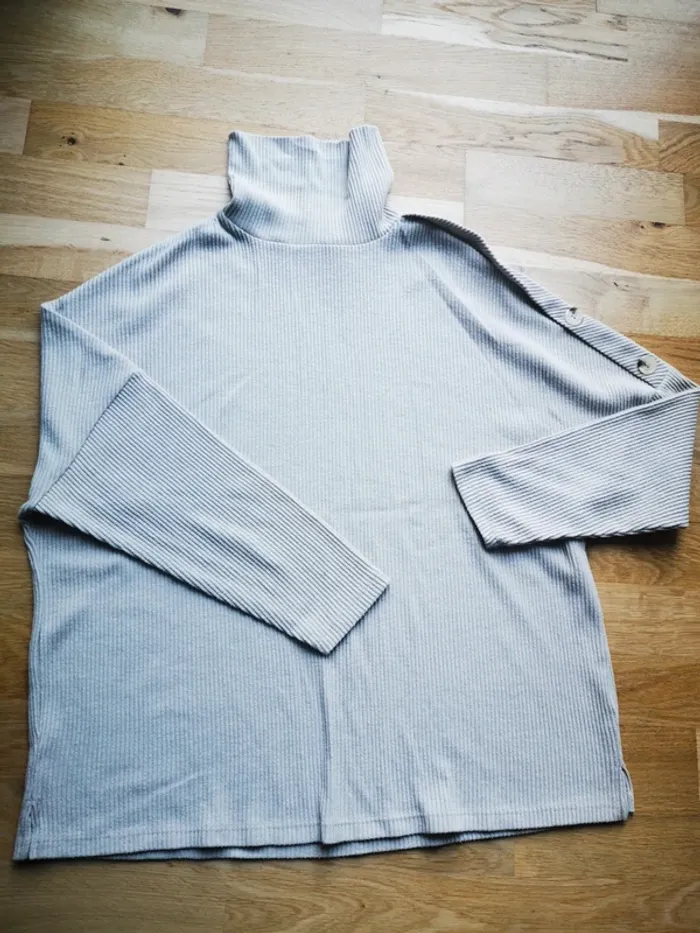 Pull col roulé