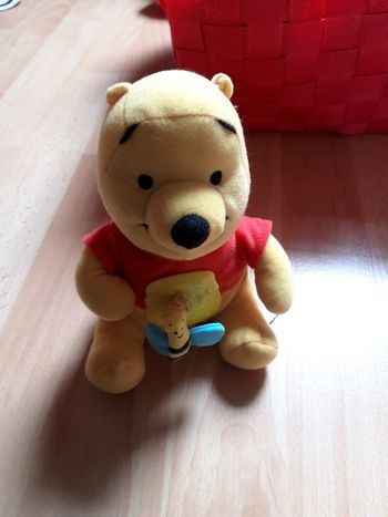 Peluche winnie l'ourson qui vibre
