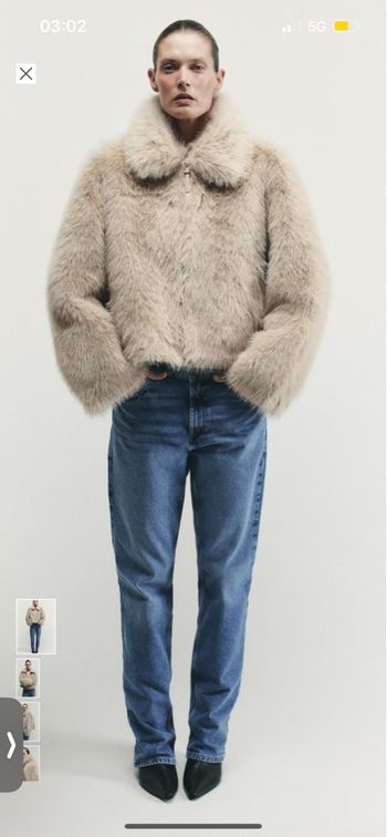 Veste en fausse fourrure double face zipée 