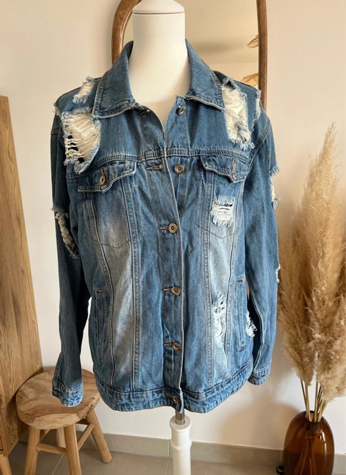 Veste en jean déchirée Vivid