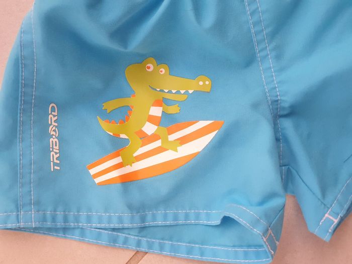 1 short de bain bleu 6-9 mois marque tribord 64/71 cm - photo numéro 2
