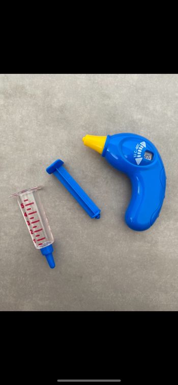 Thermomètre et seringue