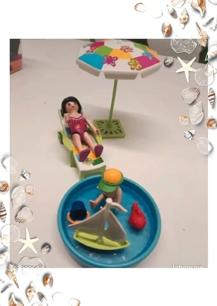 Playmobil pataugeoire 4864 avec 2 playmobils et le petit bateau