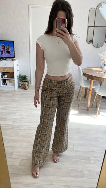 Pantalon à carreaux beige et blanc