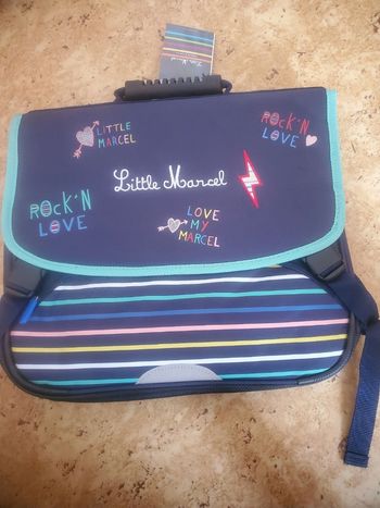 Cartable little Marcel neuf à 18€ 
Avec le code 
MUSIQUE30
Le cartable passe à 12,60€