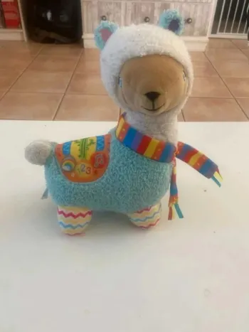 Peluche  musicale, lama