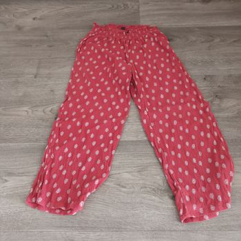 Pantalon était large