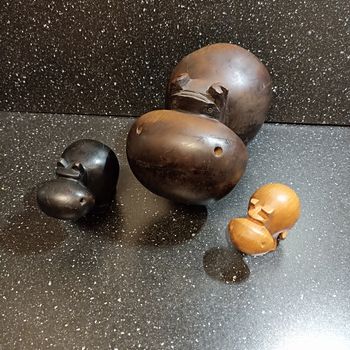 Lot de 3 sculptures en bois exotique hippopotames