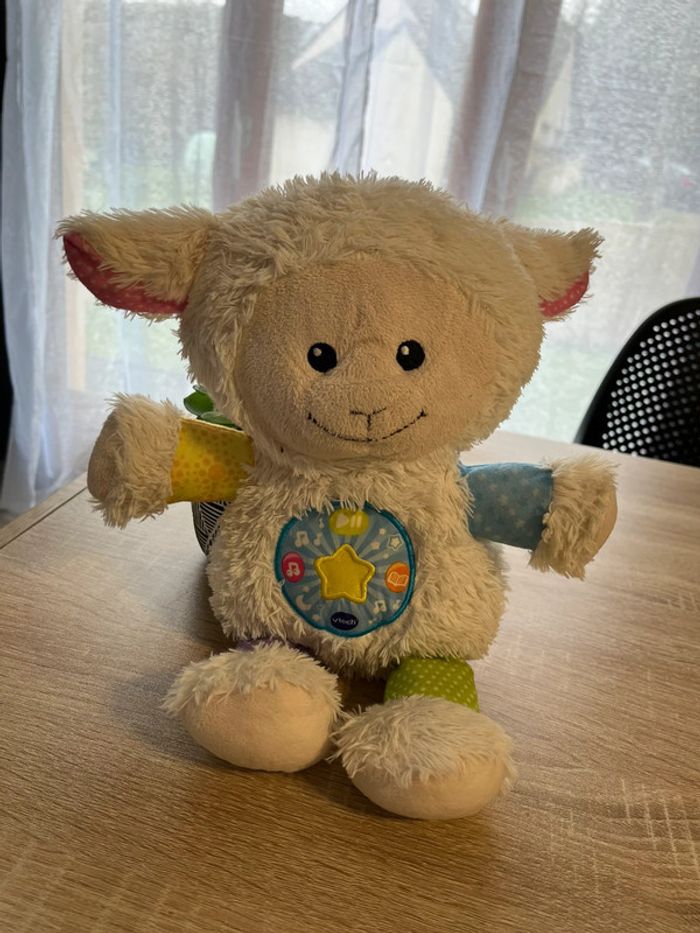 Peluche mouton interactif