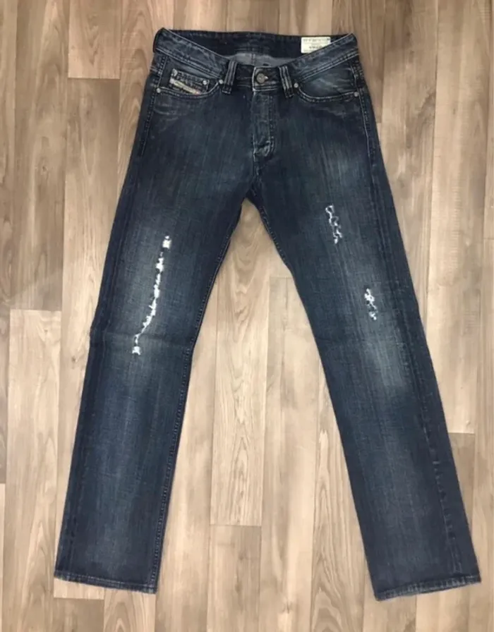 Pantalon jeans Diesel unisexe bleu marine troué taille 28/32