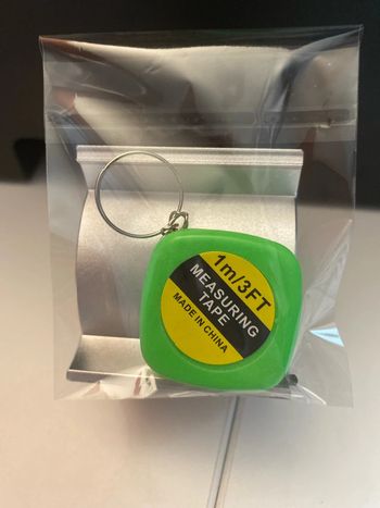 Porte clés mètre rétractable 1m