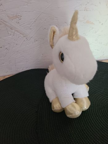 Aurora, doudou licorne Doré