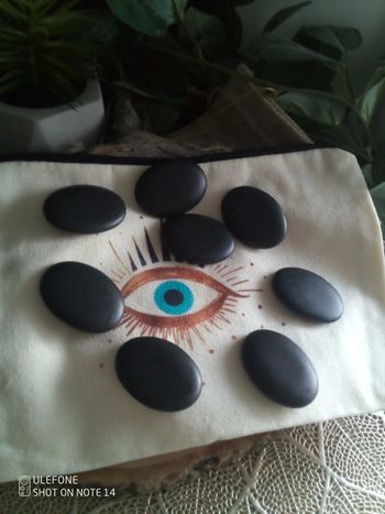 Lot de galets pour massages aux pierres chaudes + trousse