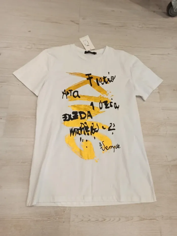 Tee shirt blanc avec flocage or et noir homme