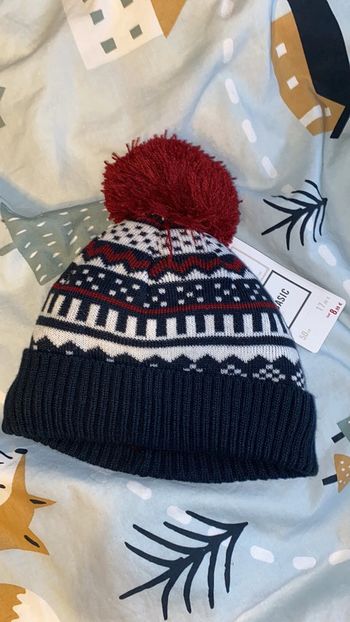 Bonnet avec ponpons orchestra