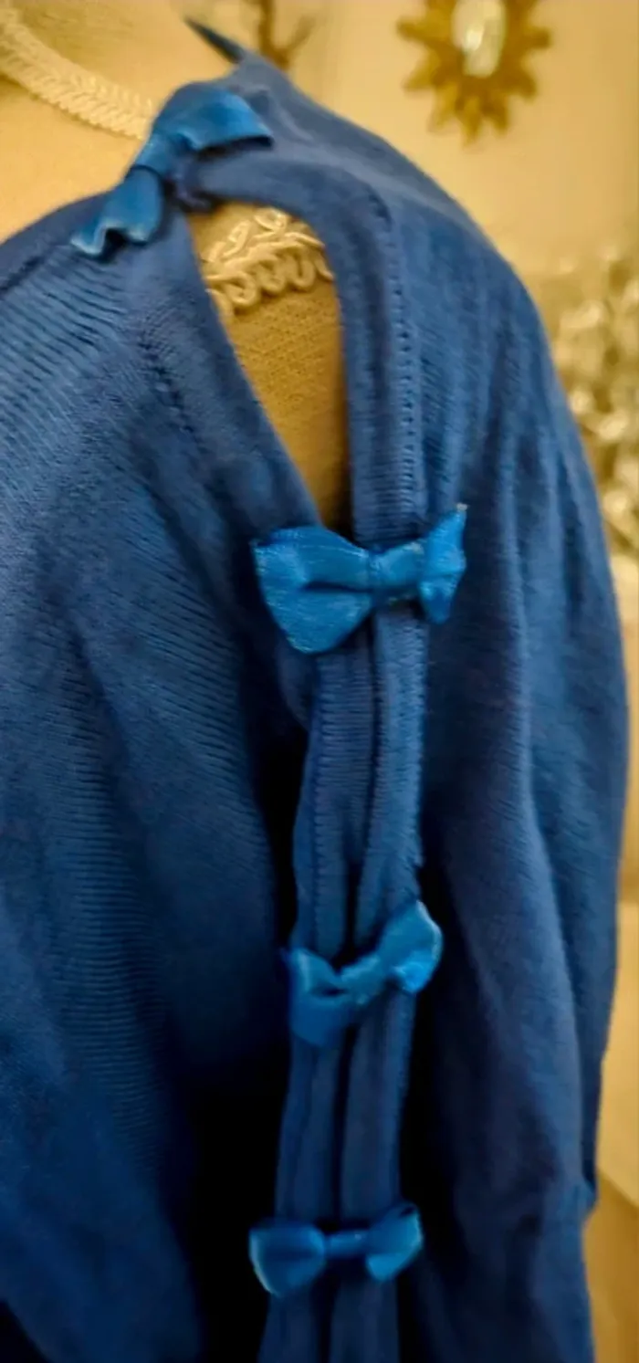 Pull fin bleu avec noeuds Millénium Taille 40/42 Neuf